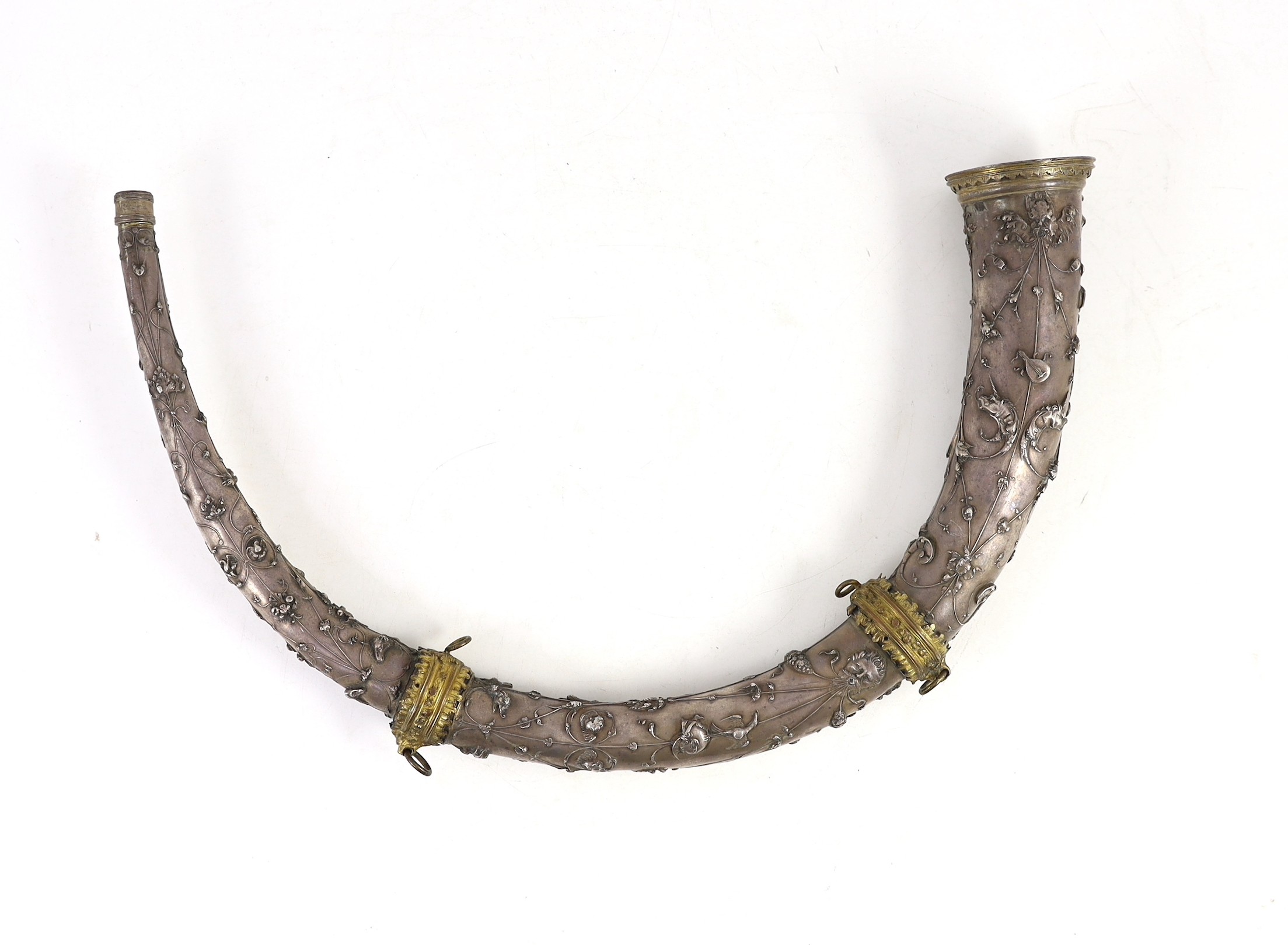 A 19th century Italian white metal hunting horn, length 40cm, depth 26cm